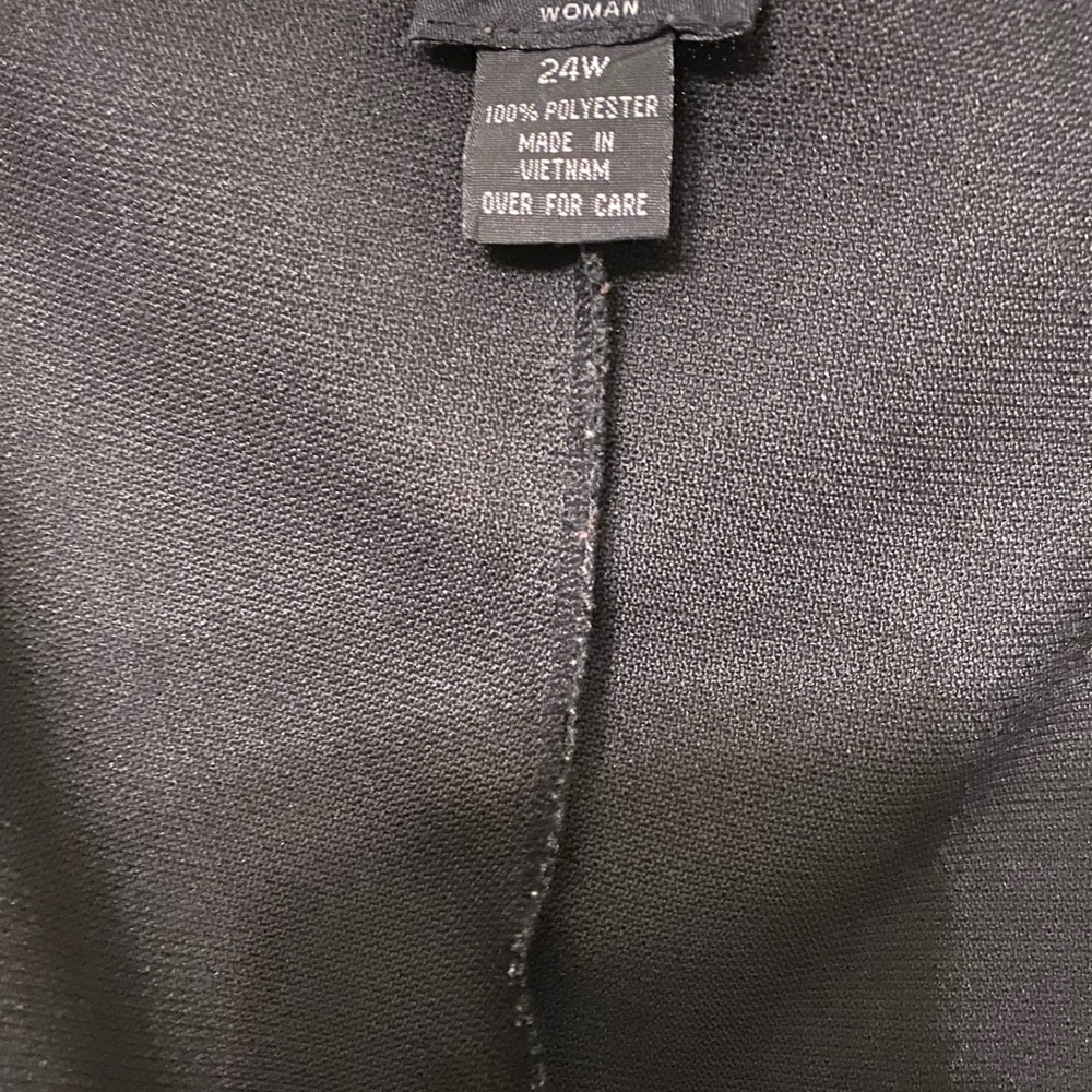 Black dress, 100% polyester, small slit in the back